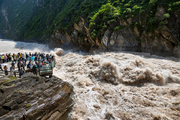 Tiger Leaping Gorge is a canyon on the Jinsha River, the primary tributary of the Yangtze River. It is located 60 kilometres north of Lijiang City, Yunnan in southwestern China.